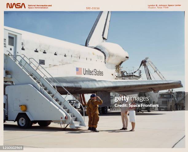 American NASA astronaut Henry W Hartsfield Jr and American NASA astronaut Thomas K Mattingly II are greeted by US President Ronald Wilson Reagan and...