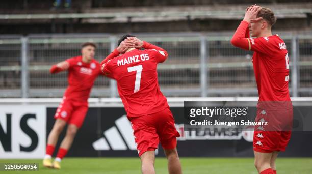 Younes Azahaf of Mainz and Nelson Felix Patrick Weiper reacts during the DFB Juniors Cup Semi-Final between FC Schalke 04 U19 and 1. FSV Mainz 05 U19...