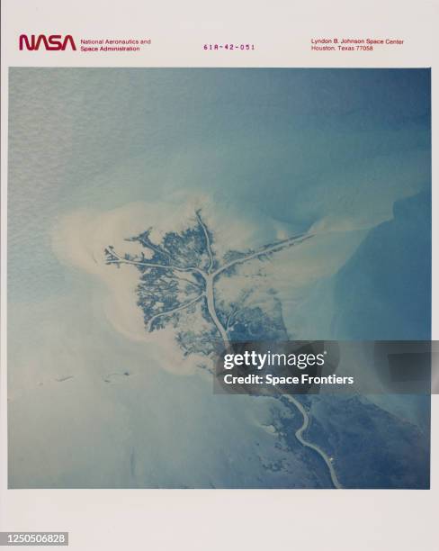 Aerial view of the Mississippi River Delta, as the Mississippi River meets the Gulf of Mexico in Louisiana, as seen from the Space Shuttle Challenger...