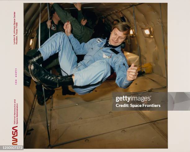 German ESA astronaut Ernst Messerschmid on the KC-135 zero-gravity simulator aircraft at Johnson Space Center in Houston, Texas, December 1984....