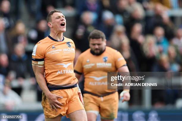 Montpellier's Italian fly-half Paolo Garbisi celebrates after scoring a penalty kick to equalise and go on extra time during the European Rugby...