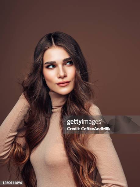 photo of young beautiful woman - beautiful woman fall stock pictures, royalty-free photos & images