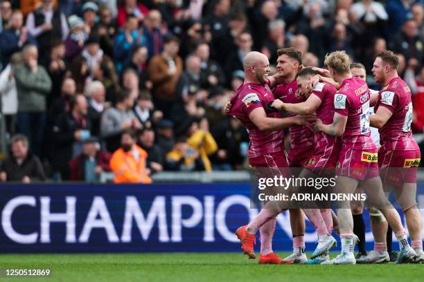 Exeter Chiefs' English hooker Jack Yeandle celebrates with teammates at the end of the European Rugby Champions Cup, Round of 16 rugby union match...