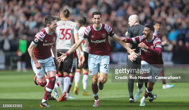 West Ham United's Nayef Aguerd celebrates scoring his side's first goal with Declan Rice and Said Benrahma during the Premier League match between...