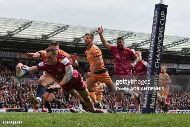 Exeter Chiefs' English full-back Tom Wyatt jumps and scores a try during the European Rugby Champions Cup, Round of 16 rugby union match between...