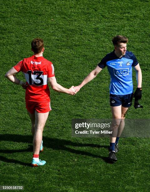 Dublin , Ireland - 2 April 2023; Daire Newcombe of Dublin and Lachlan Murray of Derry after the Allianz Football League Division 2 Final match...