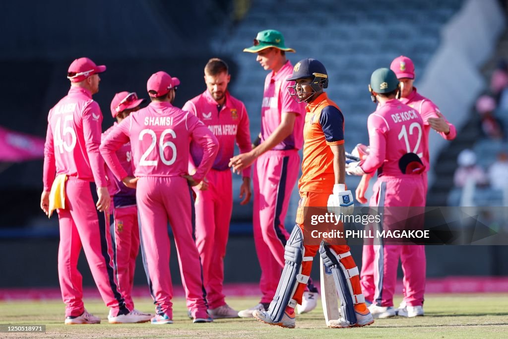 Netherland's Musa Ahmed walks back to the pavilion after being... News ...