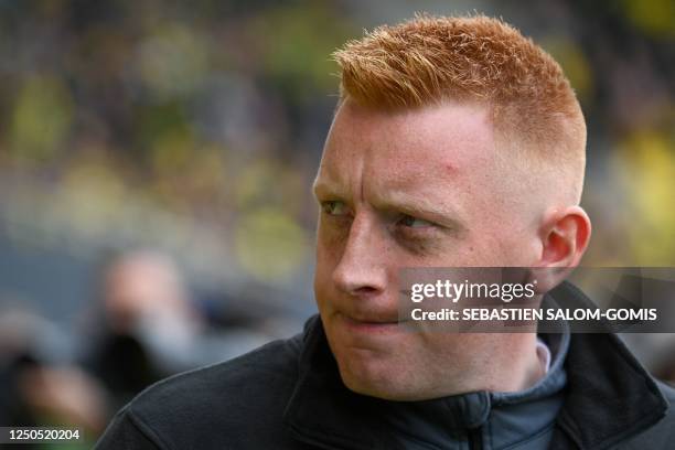 Reims' Belgian head coach Will Still looks on during the French L1 football match between FC Nantes and Stade de Reims at the Stade de la...