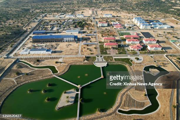 This aerial photo taken on Feb. 28, 2023 shows the view of dormitories besides a man-made lake at the Thar Coal Block-I Coal Electricity Integration...