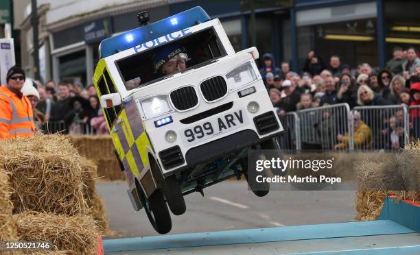 Police cadet driver takes off over the ramp on the course during the 70 year anniversary soap box derby on April 02, 2023 in Hunstanton, England....