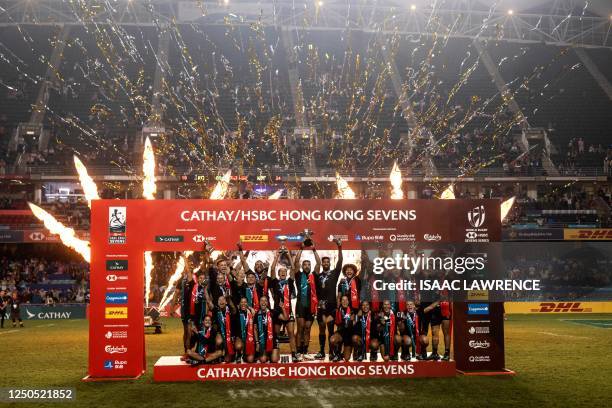 New Zealands men's and women's teams celebrate after winning the finals on the third day of the Hong Kong Sevens rugby tournament on April 2, 2023.