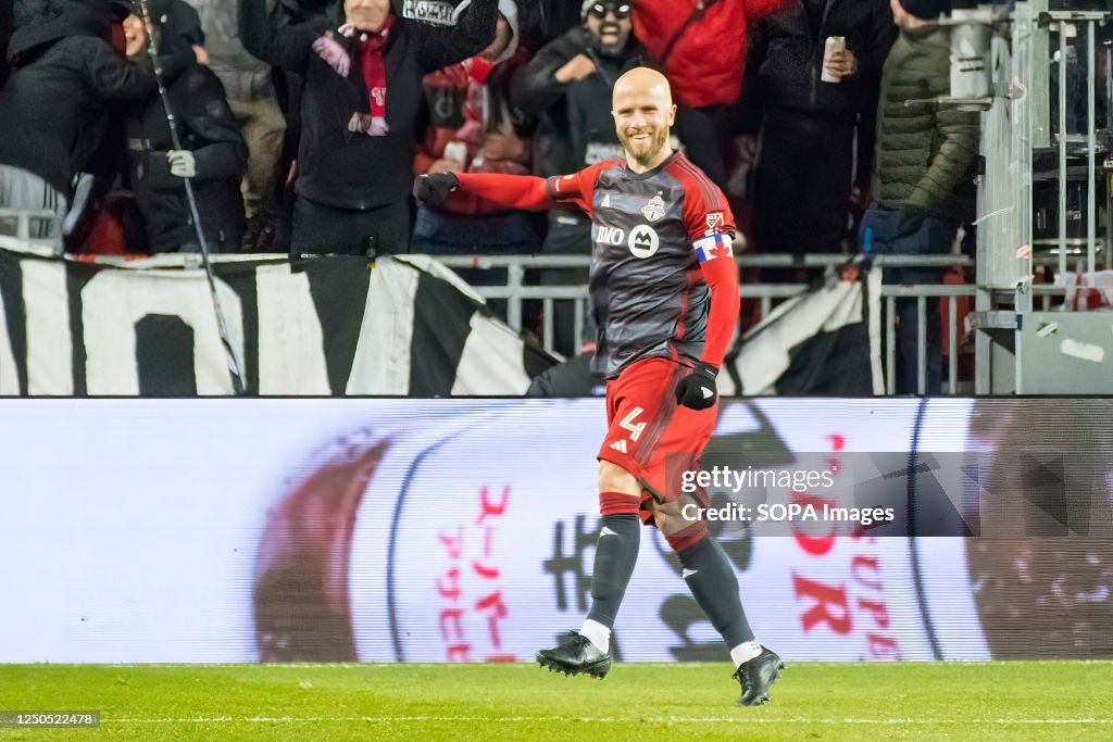 Michael Bradley #4 celebrates a goal during the MLS game...