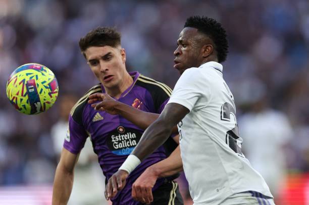 Real Valladolid's Spanish defender Ivan Fresneda vies with Real Madrid's Brazilian forward Vinicius Junior during the Spanish league football match...