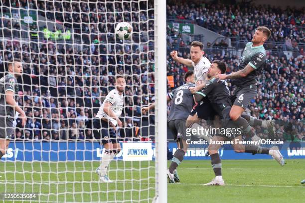 Gethin Jones of Bolton Wanderers scores their fourth goal during the Papa John's Trophy Final between Bolton Wanderers and Plymouth Argyle at Wembley...