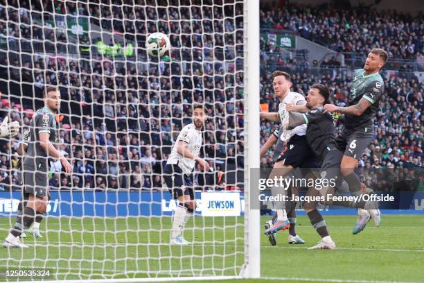 Gethin Jones of Bolton Wanderers scores their fourth goal during the Papa John's Trophy Final between Bolton Wanderers and Plymouth Argyle at Wembley...