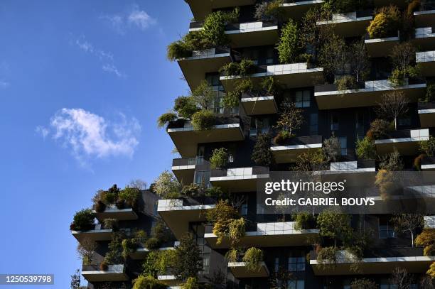 The Vertical Forest high-rise complex is pictured in Gae Aulenti square in the Porta Garibaldi - Porta Nuova district of northern Milan on April 2,...