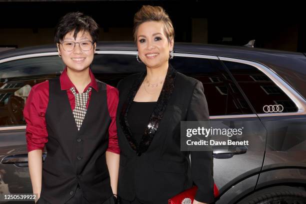Guest and Lea Salonga arrive in an Audi at the Olivier Awards 2023 at Royal Albert Hall on April 2, 2023 in London, England.