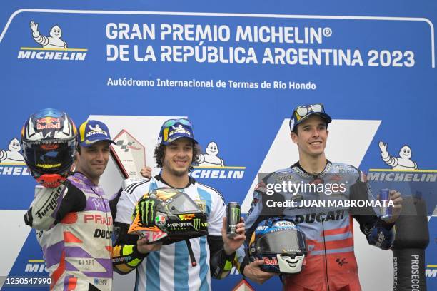 Ducati French rider Johann Zarco, Ducati Italian rider Marco Bezzecchi, and Ducati Spanish rider Alex Marquez celebrate their second, first, and...