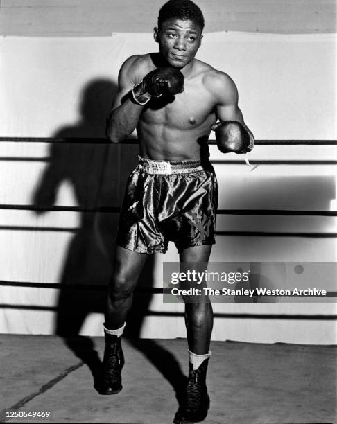 Heavyweight professional boxer Floyd Patterson of the United States poses for a portrait circa 1952 at Stillman's Gym in New York, New York....