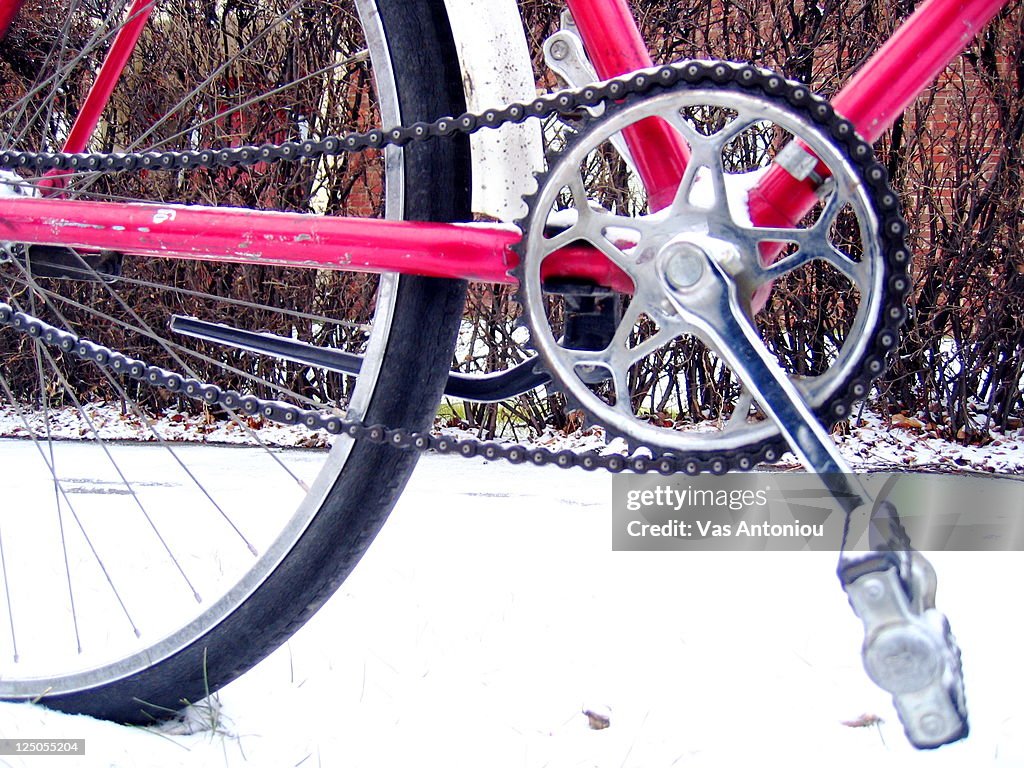 Red bicycle in snow