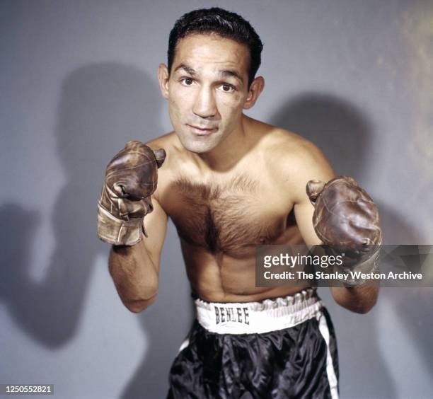 Featherweight professional boxer Willie Pep of the United States poses for a portrait circa October, 1955 in the Bronx, New York. Pep won the World...