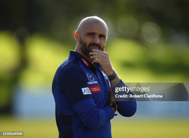 Rhyce Shaw coach of the Kangaroos looks on during a North Melbourne Kangaroos training session at Arden Street Ground on June 19, 2020 in Melbourne,...