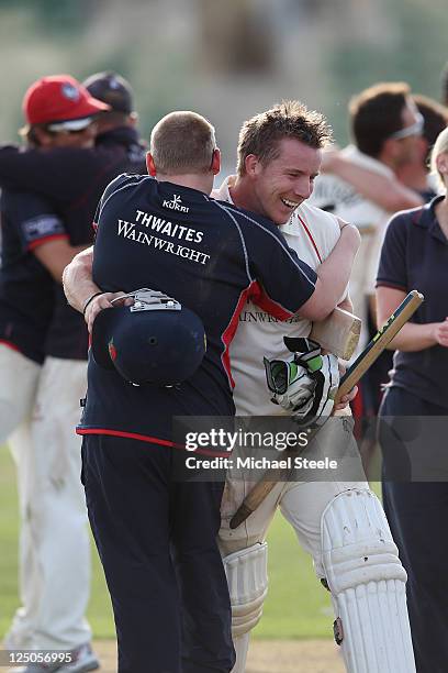 Steven Croft of Lancashire is congratulated after completing a eight wicket victory to win the Championship during the LV County Championship match...