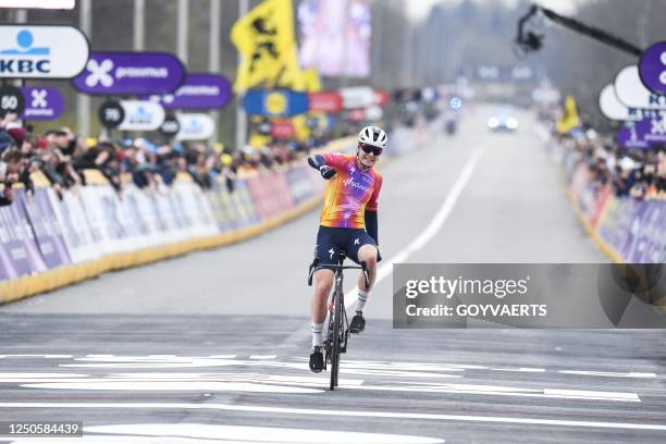 Belgian Lotte Kopecky of SD Worx crosses the finish line to win the women's race of the 'Ronde van Vlaanderen/ Tour des Flandres/ Tour of Flanders'...