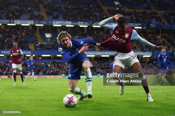 Conor Gallagher of Chelsea tangles with Leon Bailey of Aston Villa during the Premier League match between Chelsea FC and Aston Villa at Stamford...