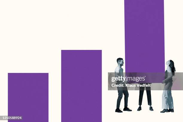 young friends carrying large purple bar graph - visual aid stock pictures, royalty-free photos & images