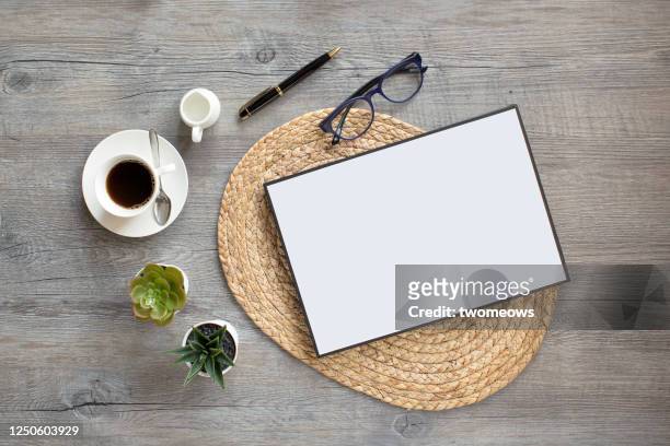 stylised flat lay coffee table top still life. - affiche spectacle stockfoto's en -beelden