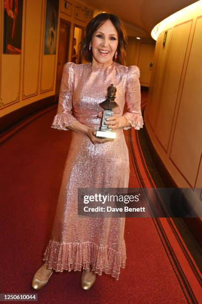 Dame Arlene Phillips, winner of the Special Award, poses backstage at The Olivier Awards 2023 at Royal Albert Hall on April 2, 2023 in London,...