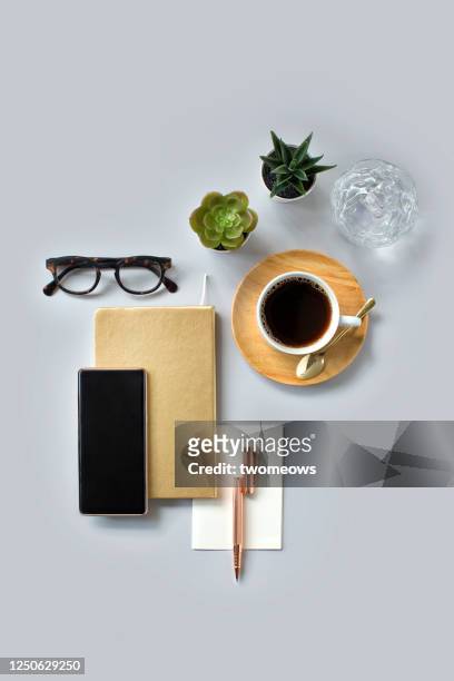 stylised modern flat lay domestic working table top still life. - schreibtisch stock-fotos und bilder