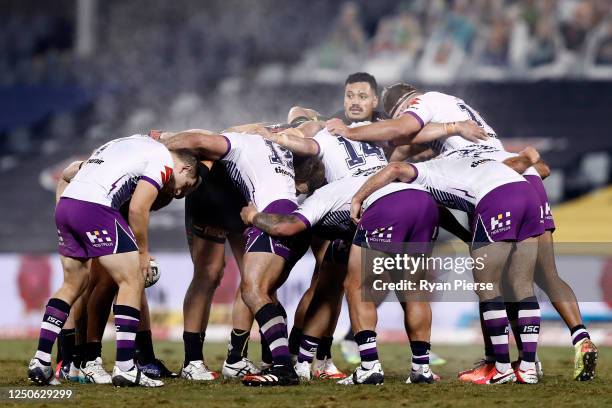 Steam rises off Panthers and Storm players as they pack a scrum during the round six NRL match between the Penrith Panthers and the Melbourne Storm...