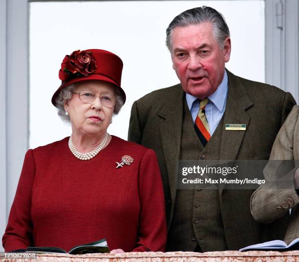 Queen Elizabeth II and Lord Samuel Vestey attend day 4 'Gold Cup Day' of the Cheltenham Festival at Cheltenham Racecourse on March 13, 2009 in...
