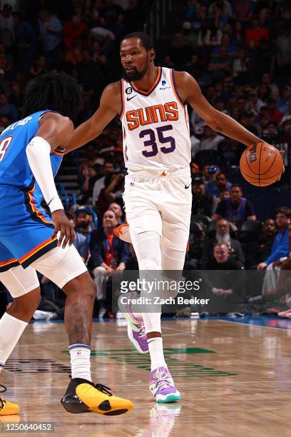 Kevin Durant of the Phoenix Suns dribbles the ball during the game against the Oklahoma City Thunder on April 2, 2023 at Paycom Arena in Oklahoma...