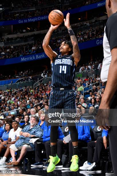 Gary Harris of the Orlando Magic shoots a three point basket during the game against the Detroit Pistons on April 2, 2023 at Amway Center in Orlando,...