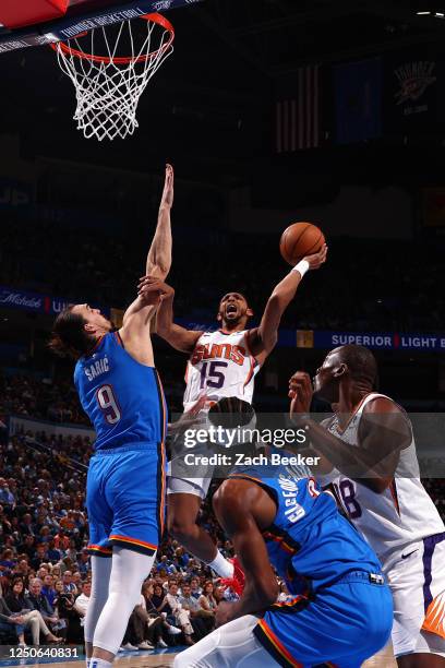 Cameron Payne of the Phoenix Suns drives to the basket during the game against the Oklahoma City Thunder on April 2, 2023 at Paycom Arena in Oklahoma...