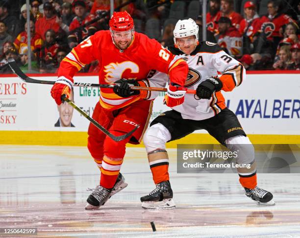 Nick Ritchie of the Calgary Flames skates against Jakob Silfverberg of the Anaheim Ducks at Scotiabank Saddledome on April 02, 2023 in Calgary,...