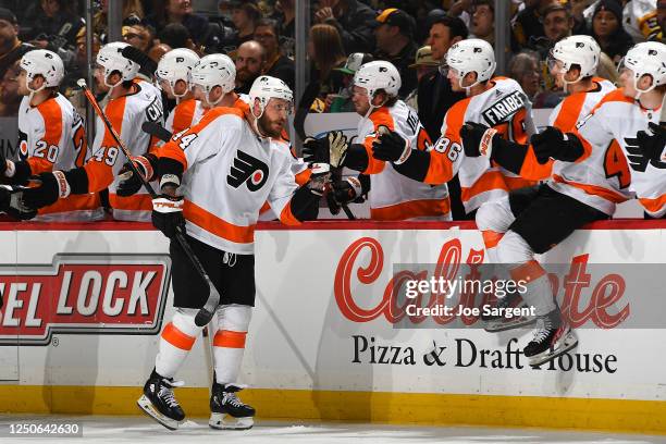 Nicolas Deslauriers of the Philadelphia Flyers celebrates his goal with the bench during the third period against the Pittsburgh Penguins at PPG...