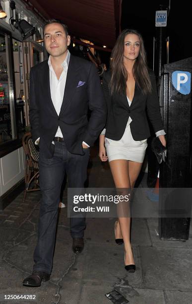 David Walliams and model Lauren Budd are seen on July 22, 2009 in London, England.