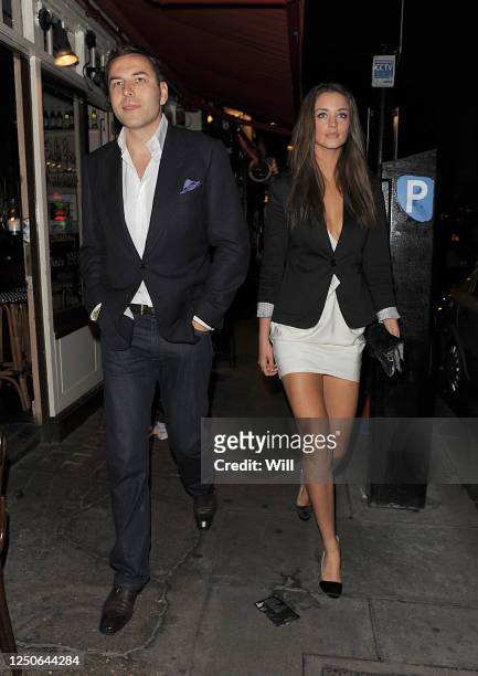 David Walliams and model Lauren Budd are seen on July 22, 2009 in London, England.