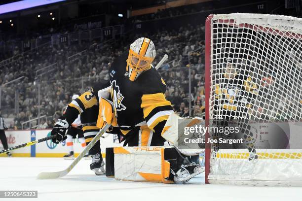Casey DeSmith of the Pittsburgh Penguins make a save against the Philadelphia Flyers at PPG PAINTS Arena on April 2, 2023 in Pittsburgh, Pennsylvania.