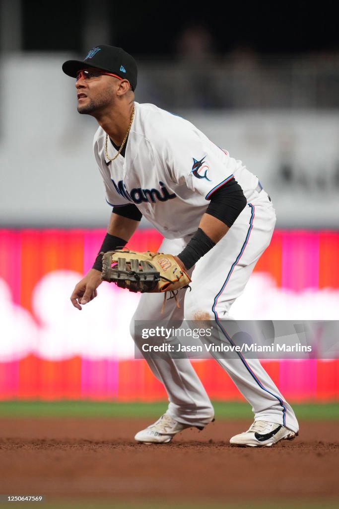 Yuli Gurriel of the Miami Marlins fields his position in the game ...