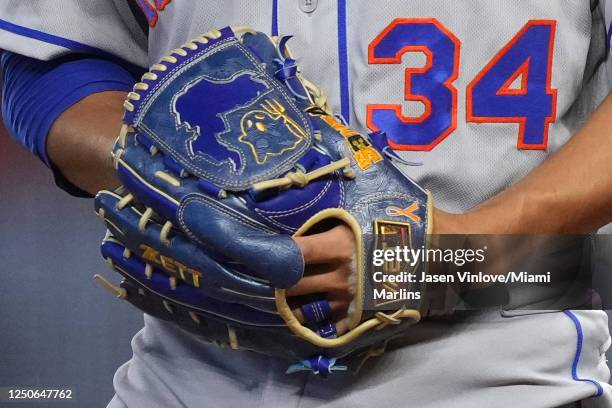 Detailed look at the glove of Kodai Senga of the New York Mets in the game against the Miami Marlins at loanDepot park on April 2, 2023 in Miami,...