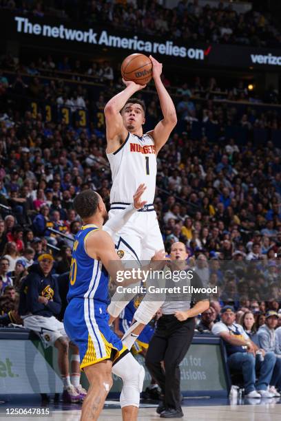 Michael Porter Jr. #1 of the Denver Nuggets shoots the ball during the game against the Golden State Warriors on April 2, 2023 at the Ball Arena in...