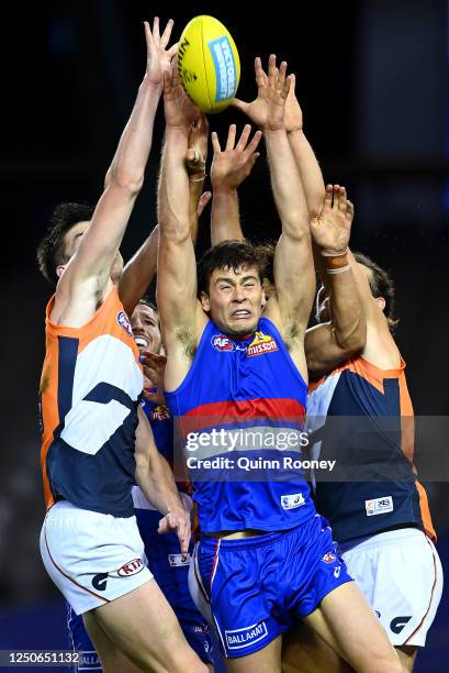 Josh Dunkley of the Bulldogs attempts to mark during the round 3 AFL match between the Western Bulldogs and the Greater Western Sydney Giants at...