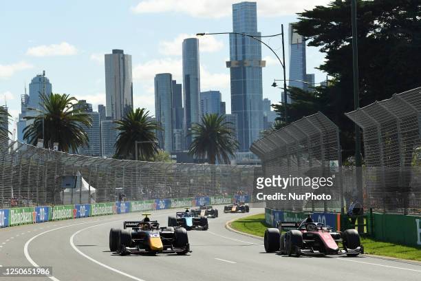 Isaac Hadjar of France passes Theo Pourchaire of France during the Formula 2 Feature Race ahead of the 2023 Formula 1 Australian Grand Prix at Albert...