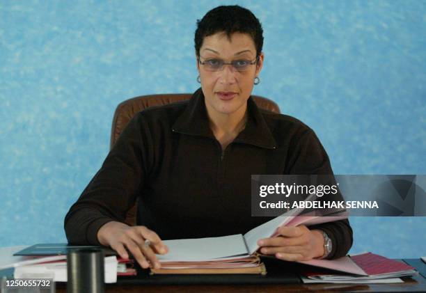 Asma Chaabi, the first and only woman mayor in Morocco, poses in her office, 27 January 2004 in her town of Essaouira, southern Morocco. The Moroccan...