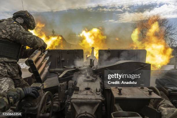 Ukrainian servicemen fire an artillery shell near the frontline area amid the Russia-Ukraine war, in Bakhmut, Ukraine on April 02, 2023.